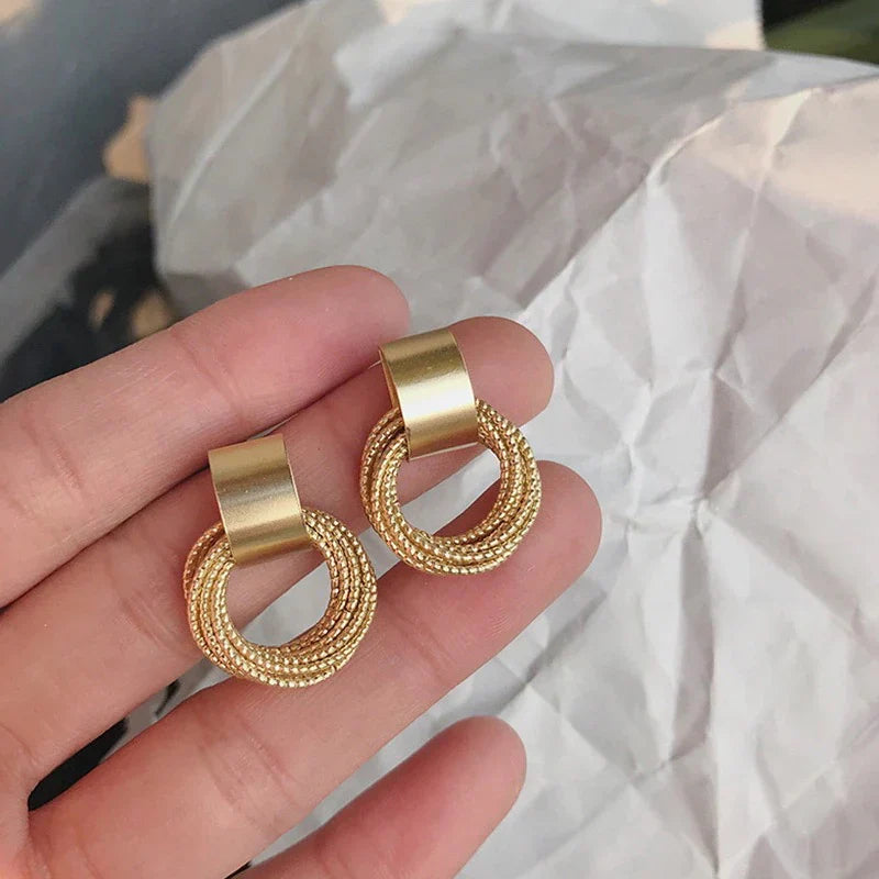 Vioraia Metal Ring Tassel Earrings