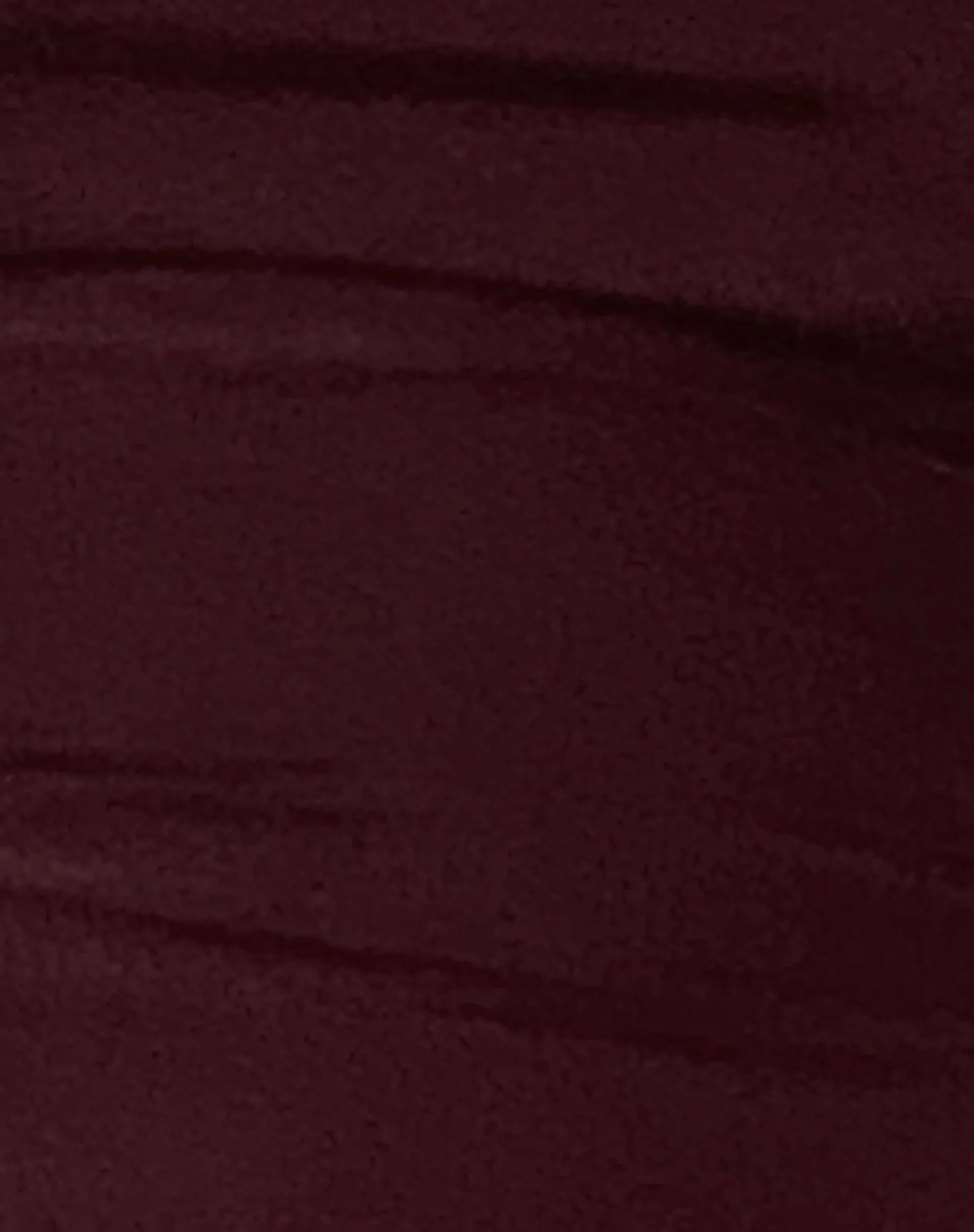 Litera Ruffle Mini Dress in Deep Plum with Rosette