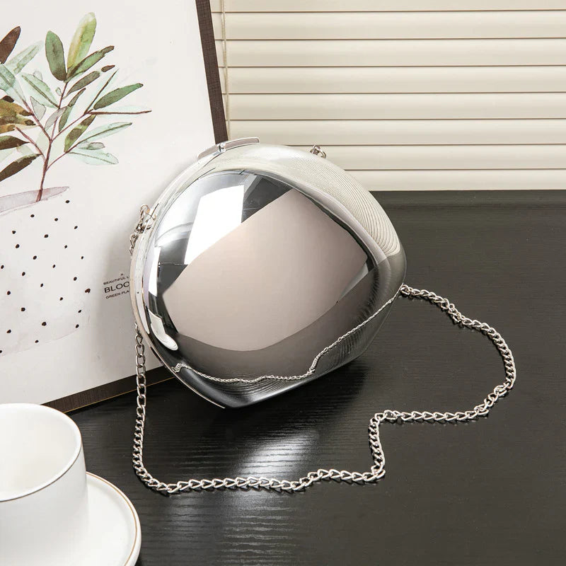 Vioraia Lustre Dome Clutch Bag